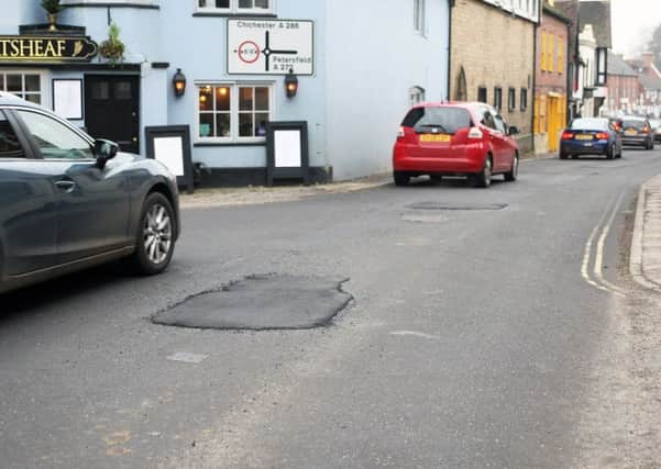 DM1810470a.jpg Potholes filled agin in Rumbolds Hill, Midhurst. Photo by Derek Martin Photography. SUS-180901-162722008
