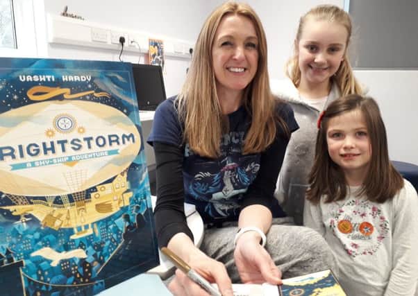 Author Vashti Hardy with pupils at the book signing