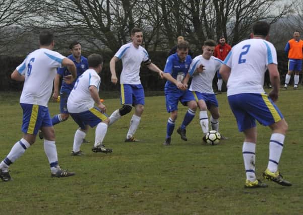 Action from the Premier Travel Challenge Cup semi-final between Sidley United and Northiam 75. Pictures by Simon Newstead