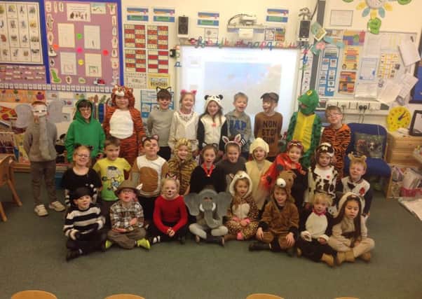 Arunside School pupils dressed in their costumes for their RSPCA fundraiser SUS-180320-100816001