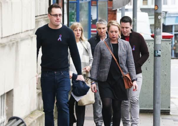 Frank Milligan's family going into Lewes Crown Court yesterday (March 15). Picture: Eddie Mitchell