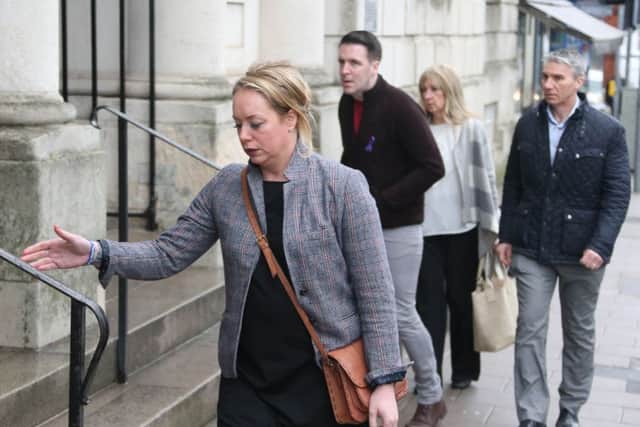 Frank Milligan's daughter Natalie Cadman with her family outside Lewes Crown Court. Picture: Eddie Mitchell
