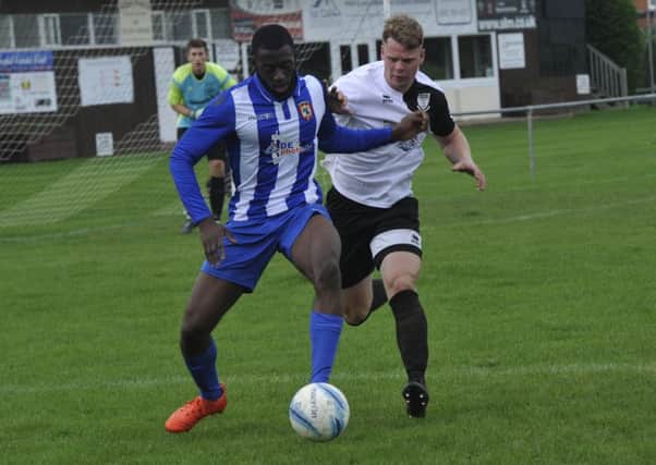 Action from Bexhill United's 3-0 defeat at home to tomorrow's opponents Lingfield earlier in the season.