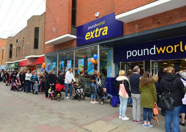 Scores of people queued outside Poundworld Extra when it opened