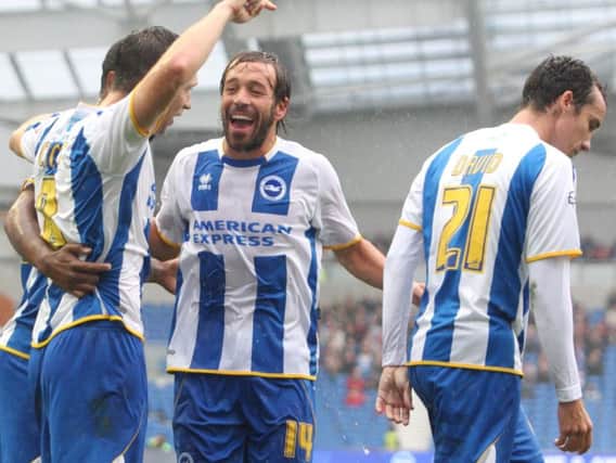 Inigo Calderon celebrates a goal during his Brighton days. Picture by Angela Brinkhurst