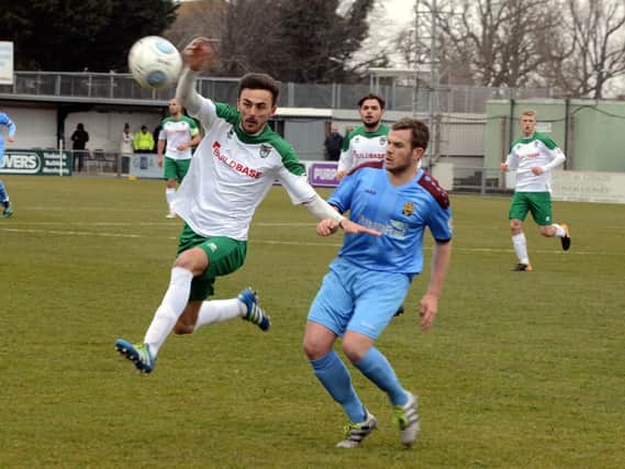 Jimmy Muitt takes to the air for the Rocks against East Thurrock / Picture by Kate Shemilt