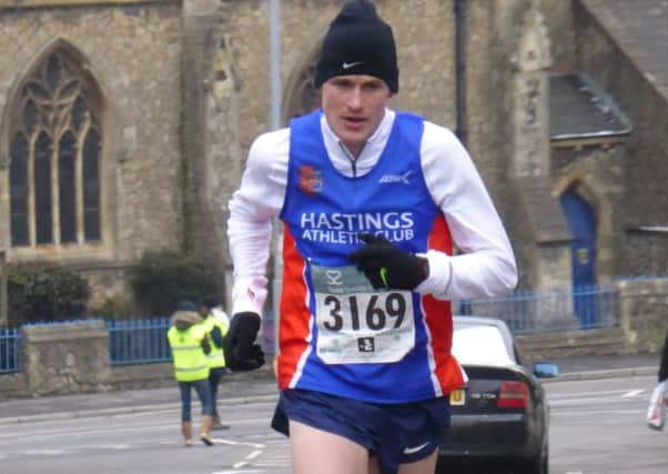 Adam Clarke on his way to victory in the 2018 Hastings Half Marathon. Pictures by Simon Newstead