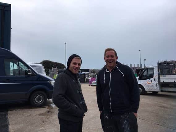 Some of the first customers to visit Chandlers Building Supplies at Shoreham Port this morning