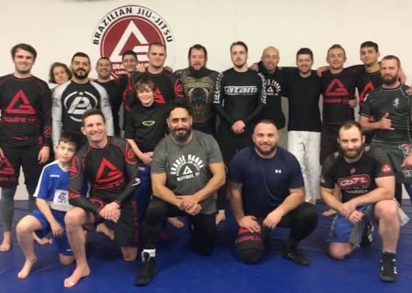 Participants in a free seminar at Gracie Barra Hastings to help raise money for the Demelza Hospice Care for Children charity SUS-180319-142330002