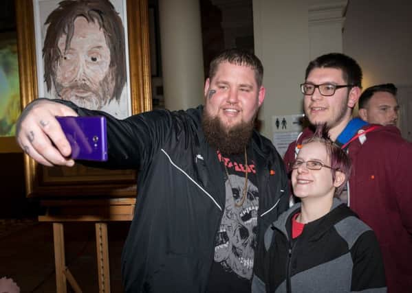 Brit award-winning singer-songwriter Rag 'n ' Bone Man (Rory Graham) takes a selfie with two young musicians at the St Paul's Centre in Worthing, at an event bringing together young musicians, venues and producers in the town. Picture: Scott Ramsey at www.scottramsey.co.uk