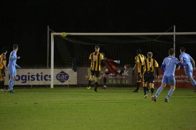 Curtis Gayler's superb hit arrows towards the top corner against East Grinstead. Picture by John Lines