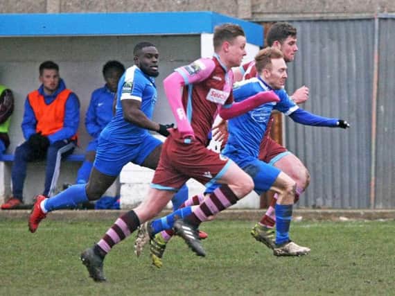 Action from Shoreham's clash with Corinthian Casuals on Saturday. Picture by Derek Martin