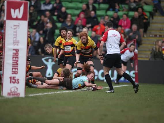 Worthing College student Roberta Haywood goes over for Harlequins in their victory over Richmond