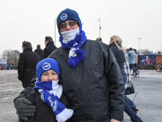 Albion fans wrapped up warm at Old Trafford on Saturday. Picture by Phil Westlake (PW Sporting Photography)