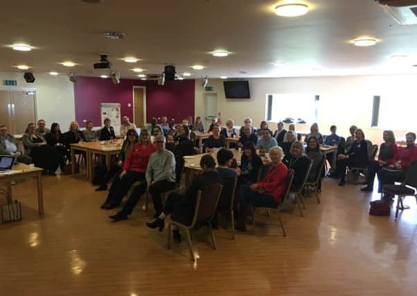 Staff from the nine GP surgeries meeting at Bognor FC last week to share their progress