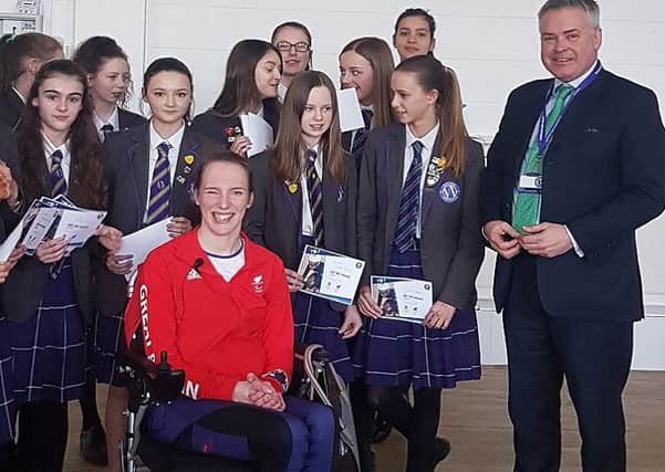 Tim with Paralympian Sophie Christiansen and students from Worthing High School
