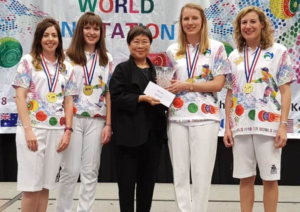Emma Cooper (second-left) with the England team at the 21st Tiger Bowls World Invitation in Hong Kong.
