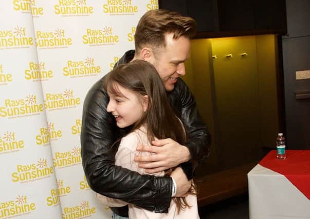 Madison from Horsham meeting Olly Murs SUS-180904-105341001