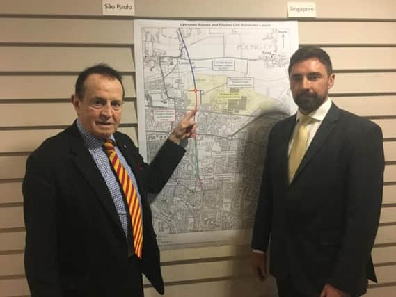 A public meeting of the North Littlehampton housing development was held in The Loft in the Body Shop headquarters. Deputy mayor of Littlehampton James Walsh with Rob Clarke from Persimmon Homes in front of a map of the proposed Lyminster Bypass map