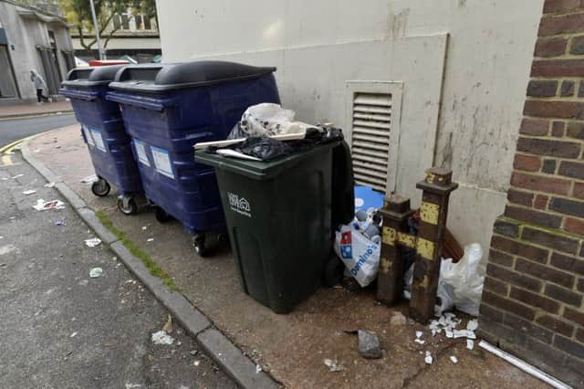 Over flowing refuse bins next to old post office in Eastbourne (Photo by Jon Rigby) SUS-171026-093102008