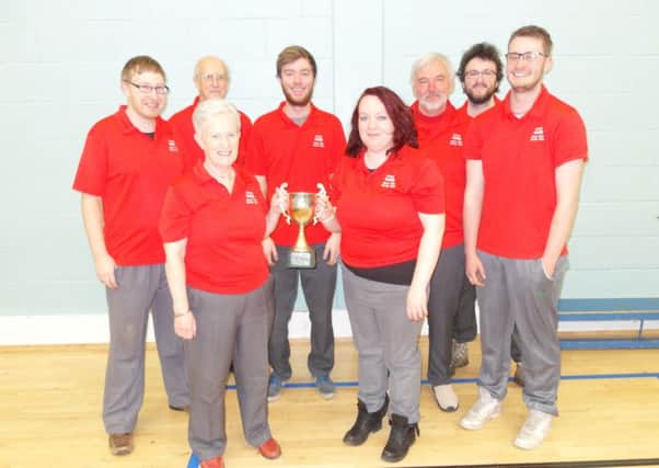 Infinity's bowlers with the Knockout Cup