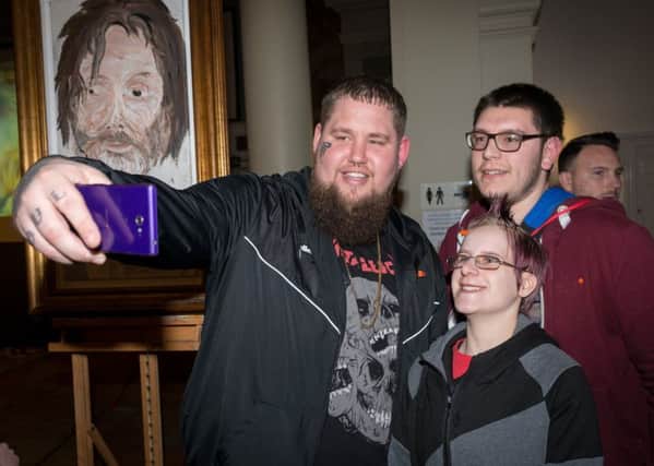 Brit award-winning singer-songwriter Rag 'n ' Bone Man (Rory Graham) takes a selfie with two young musicians at the St Paul's Centre in Worthing, at an event bringing together young musicians, venues and producers in the town. Picture: Scott Ramsey at www.scottramsey.co.uk