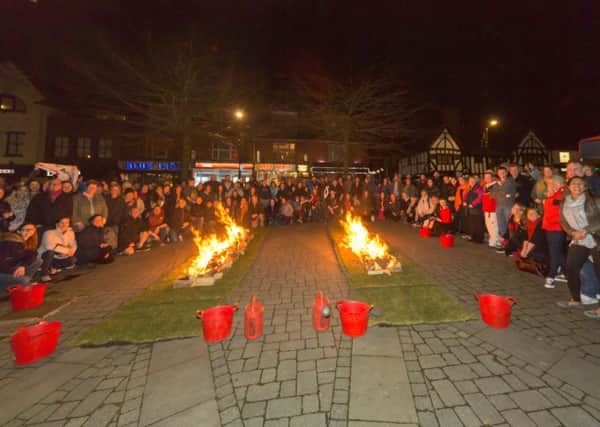 A great turnout for a fundraising firewalk in aid of St Catherine's Hospice SUS-180326-153642001