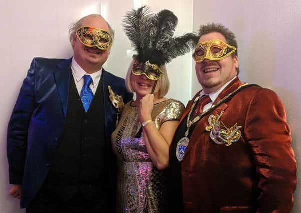 Chris Blanchard-Cooper, Jacky Pendleton and Billy Blanchard-Cooper enjoying the masquerade ball