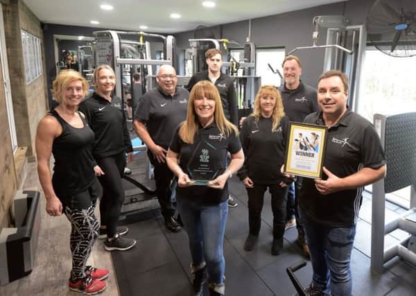 ks180135-1 Gym of Year phot kate

The team at Harbour Way Country Club who won Gym of the Year.
Owners Trevor Keet, front right and his wiife Mandy, centre.ks180135-1 SUS-180327-210644008