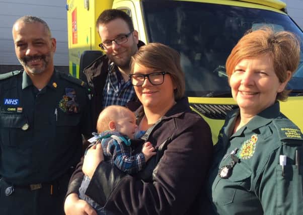 Baby Daniel Gearing with parents Sophie and Jonathan and the ambulance crew who delivered litttle Daniel