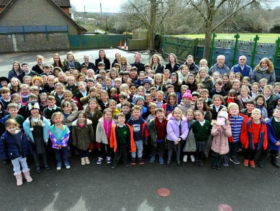 Staff and children at Colgate Primary School