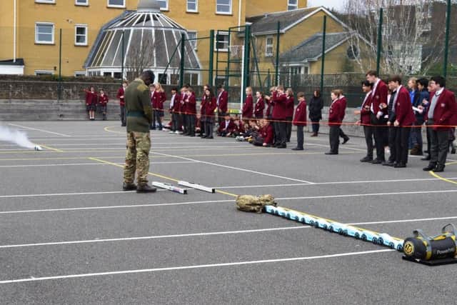 With the Army outreach team supervising the explosives, the cars were raced against the clock