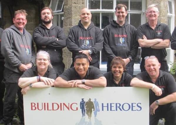 Some of the successful veterans who are set to graduate in construction thanks to Pulborough-based charity Building Heroes SUS-180328-100635001