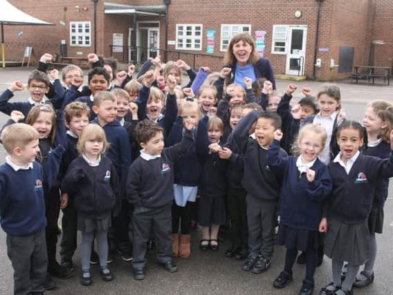 Headteacher Diane South with some of the children at Lyndhurst Infant School