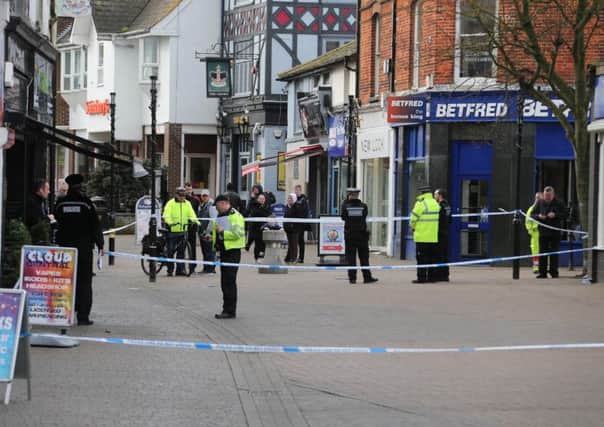 Littlehampton High Street was cordoned off in response to the stabbings. Picture: Eddie Mitchell