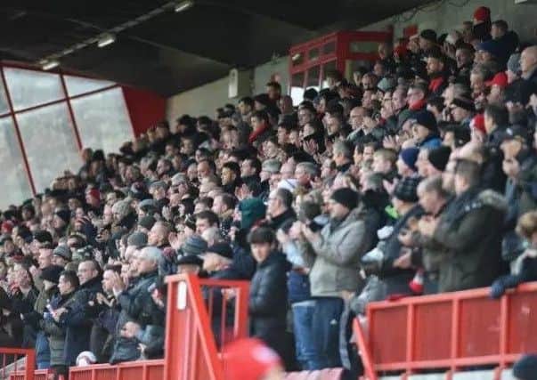 Crawley Town fans watching the recent Pay What You Can match against Hartlepool. Picture by Phil Westlake