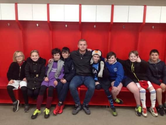 Mark Connolly with young fans