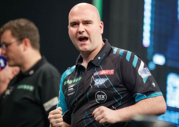 Rob Cross celebrates during his victory over Gerwyn Price in Glasgow last week. Picture courtesy Steve Welsh/PDC