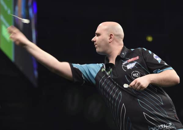 Rob Cross at the oche against Daryl Gurney in Belfast. Picture courtesy Michael Cooper/PDC