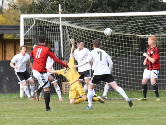 Jamie Weston fires the Heath into the lead. Loxwood v Haywards Heath Town. Picture by Grahame Lehkyj
