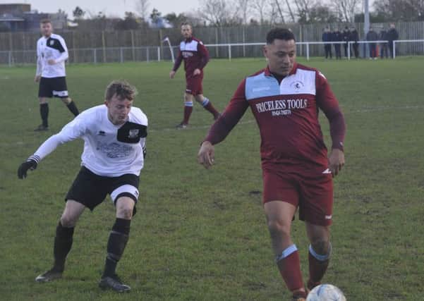 Little Common midfielder Wes Tate on the ball during the reverse fixture against Bexhill United on Boxing Day.