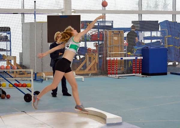 Fleur Hollyer goes for glory in the shot putt / Picture by Lee Hollyer