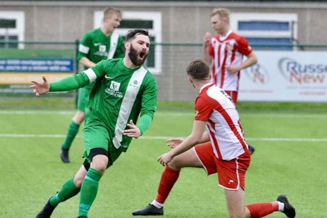 Jamie McKenzie netted twice in Mile Oak's derby win over rivals Steyning Town. Picture by Stephen Goodger