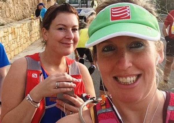 London Marathon runners Gemma Early, right, and Jade Fish