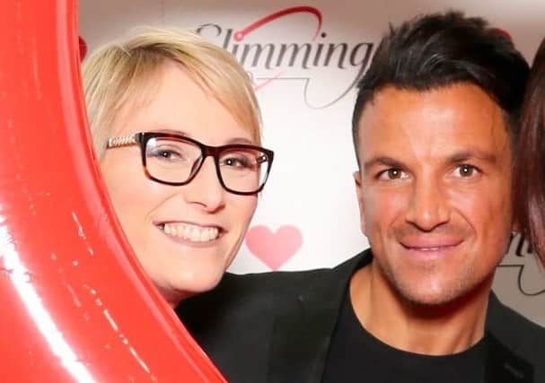 Michelle Ferris Talbot with singer Peter Andre at the annual awards in January
