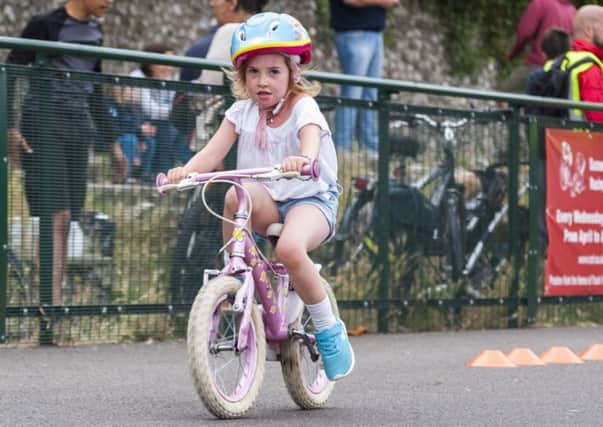 A young rider at a previous charity bike-ride