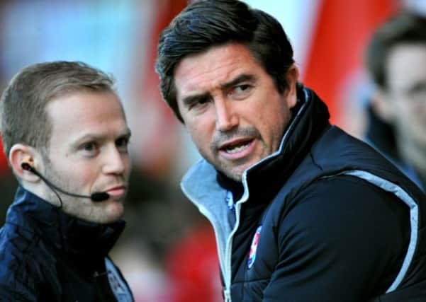 Crawley Town FC v Lincoln FC. Harry Kewell and the fourth official. Pic Steve Robards SR1804790 SUS-180219-111446001