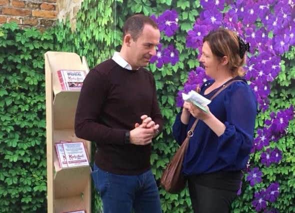 Money expert Martin Lewis speaking to organiser Emma Neno about the #CancerWiseRocks campaign