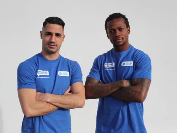 Brighton and Hove Albion stars Beram Kayal and Gaetan Bong showing their support for AITCs Speak Up Against Cancer campaign