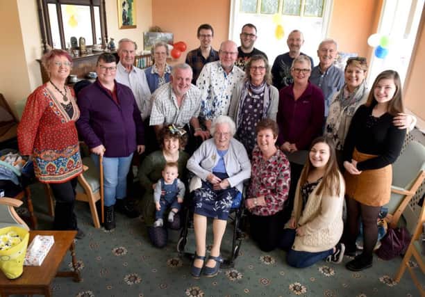 Ena Banks celebrates her 100th birthday at Glenmuir Care Home, St Leonards.  Ena pictured with her family. SUS-180304-170610001